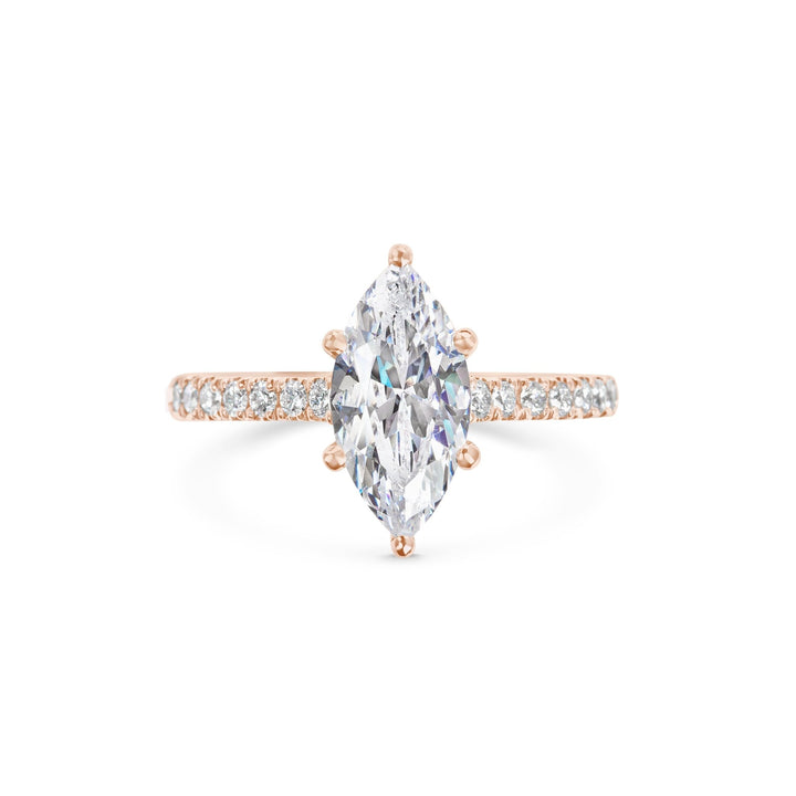 Unboxing view of marquise cut pave diamond engagement ring