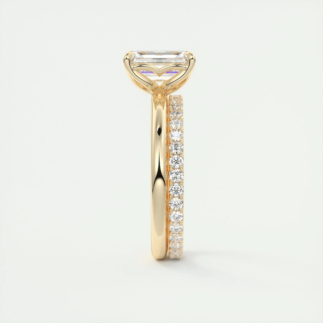 Emerald cut solitaire engagement ring shown in real-life wear
