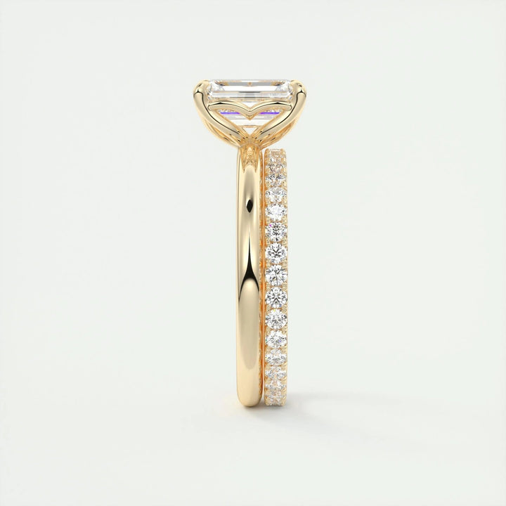 Emerald cut solitaire engagement ring shown in real-life wear