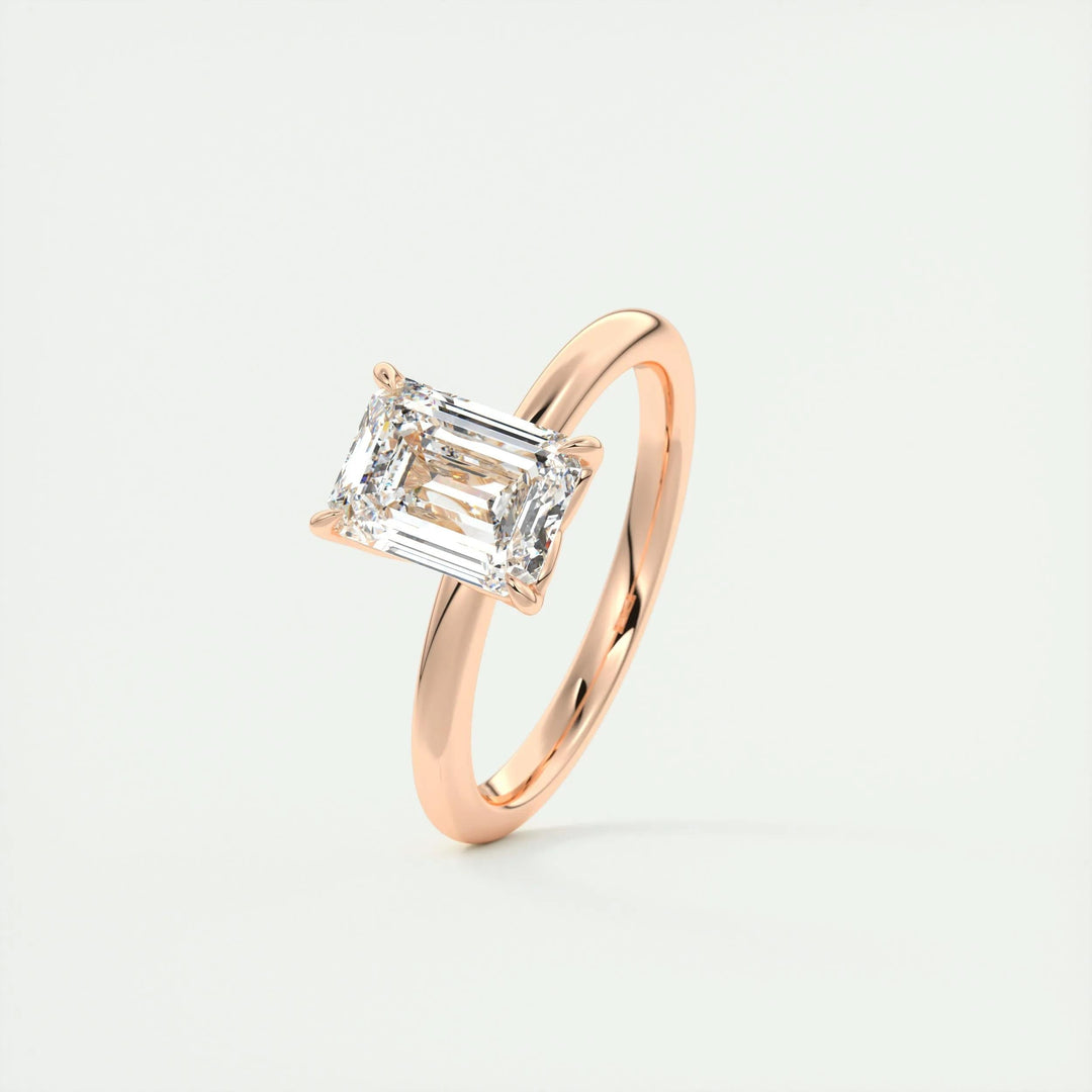 Emerald solitaire ring set with an IGI graded diamond