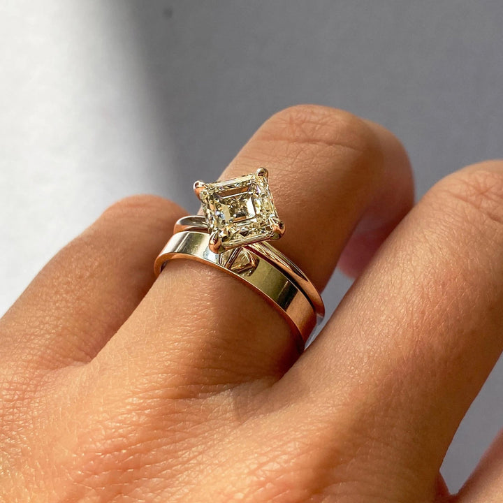 Asscher solitaire diamond engagement ring available in multiple metals