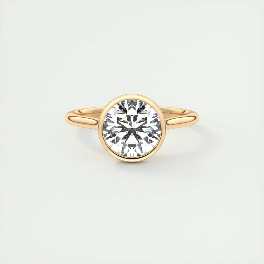 Round cut engagement ring side view showing band detail