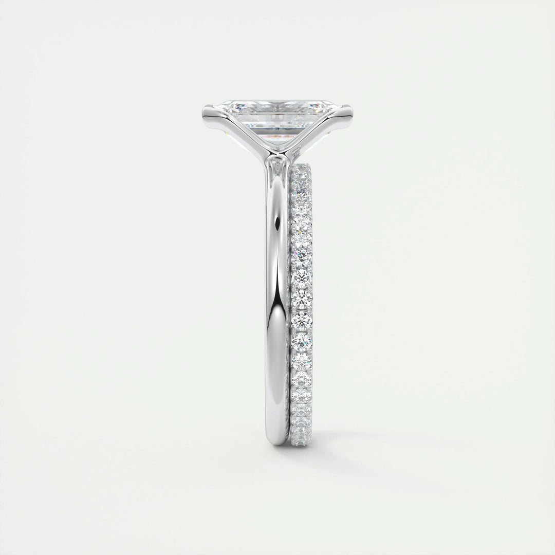 Fine craftsmanship detail on emerald solitaire engagement ring