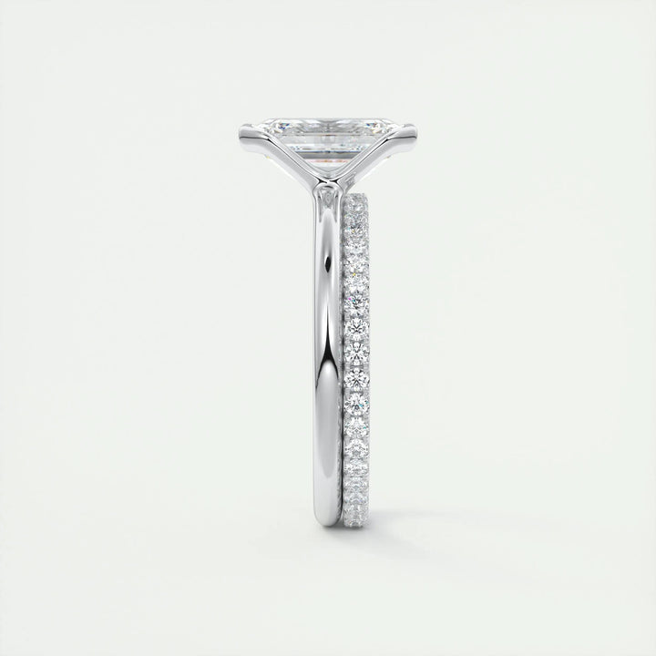 Fine craftsmanship detail on emerald solitaire engagement ring
