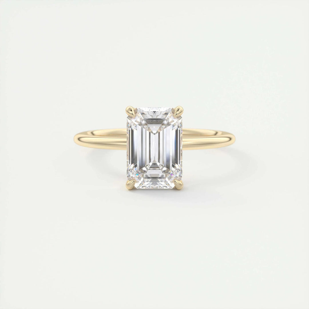 Close-up of emerald cut center diamond in solitaire engagement ring