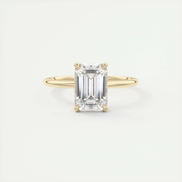 Close-up of emerald cut center diamond in solitaire engagement ring