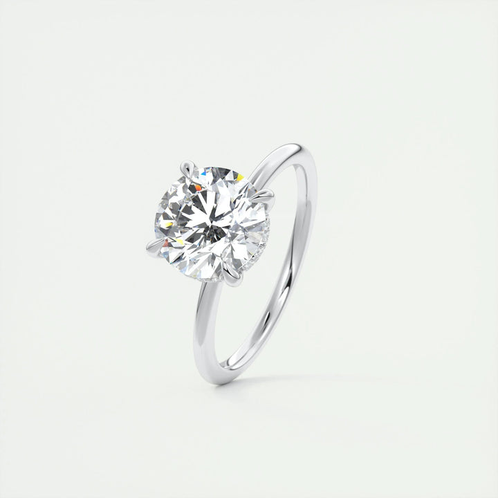 Profile view of round cut hidden halo engagement ring band