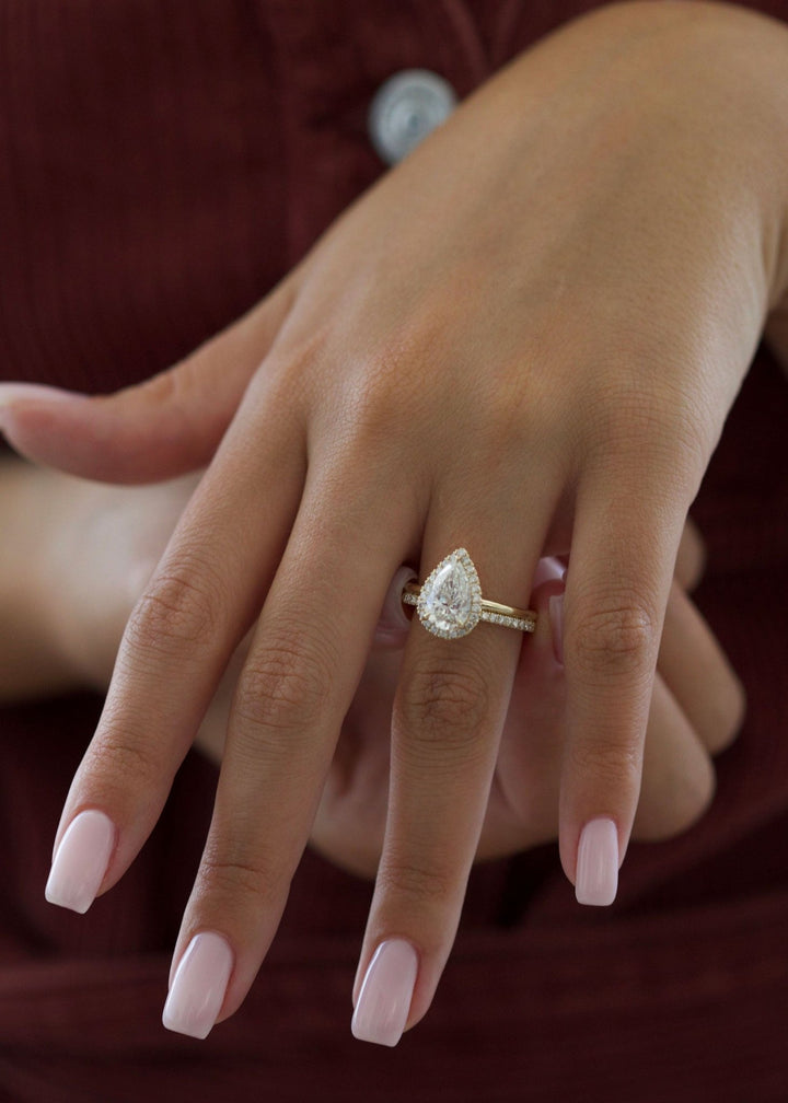 Pear halo lab grown diamond ring in jewelry gift box