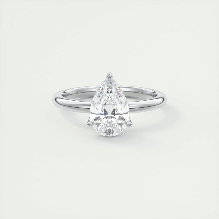 Top-down view of pear cut solitaire engagement ring