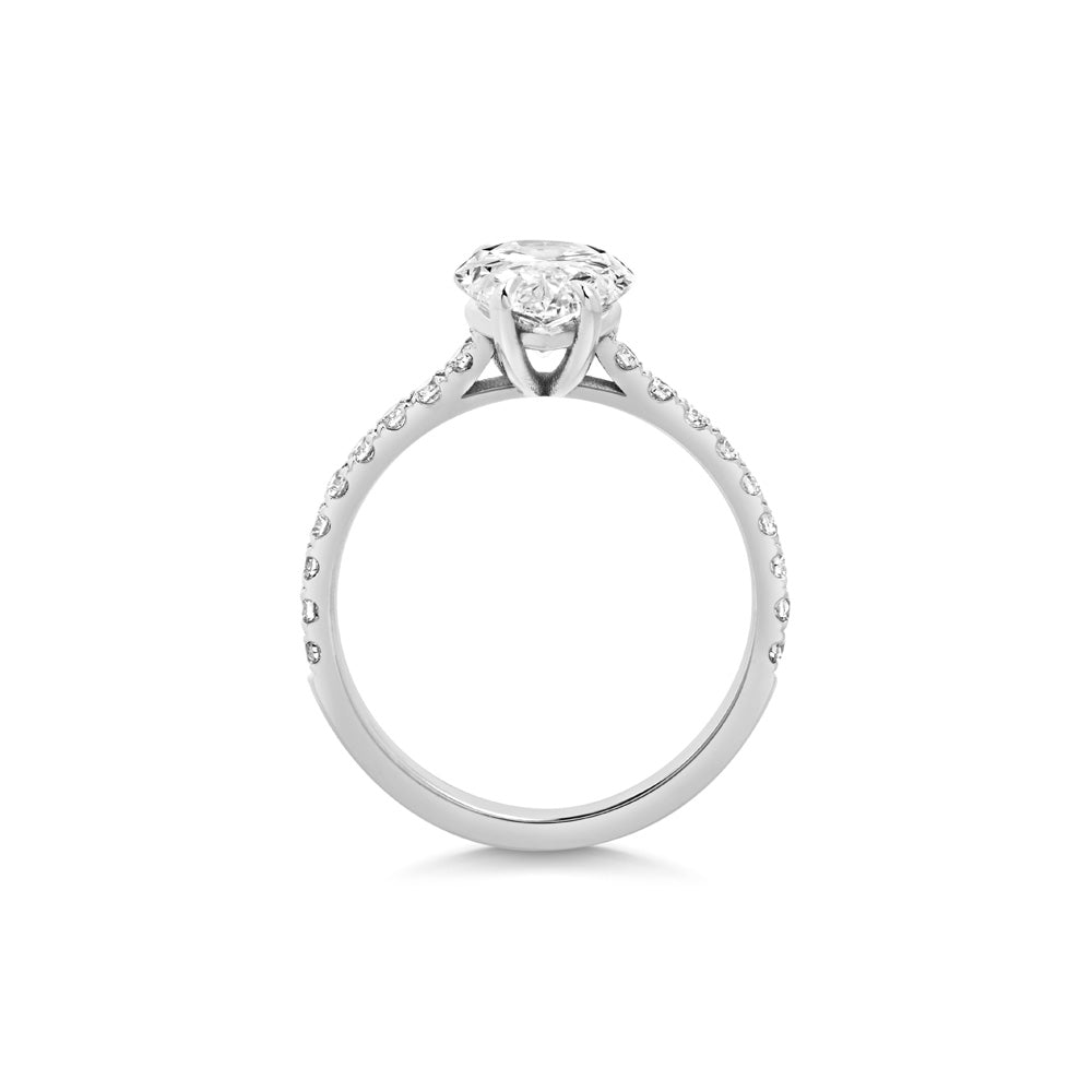 Pear pave engagement ring finished in polished solid gold