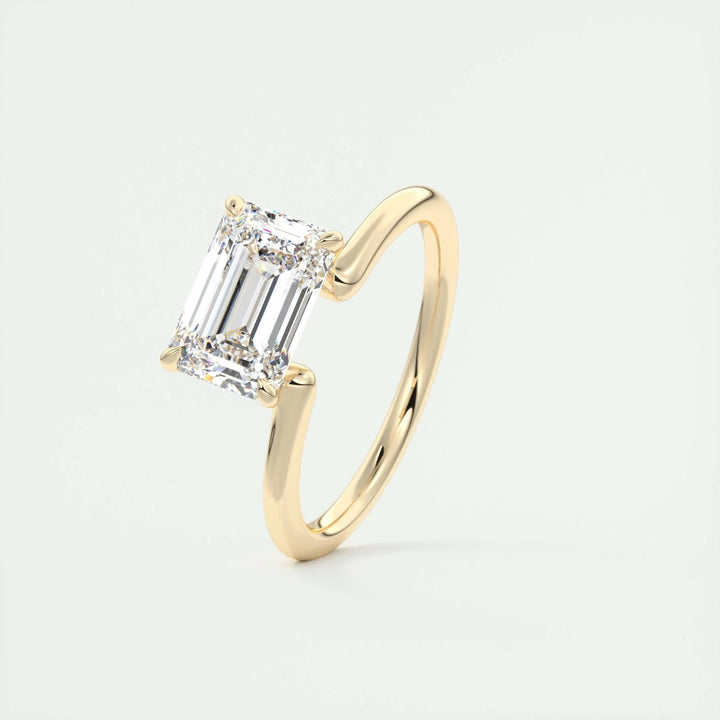 Emerald solitaire lab grown diamond ring fitted on finger