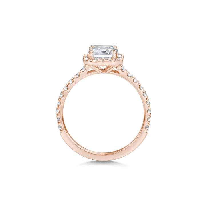 Certified emerald cut diamond featured in pave engagement ring