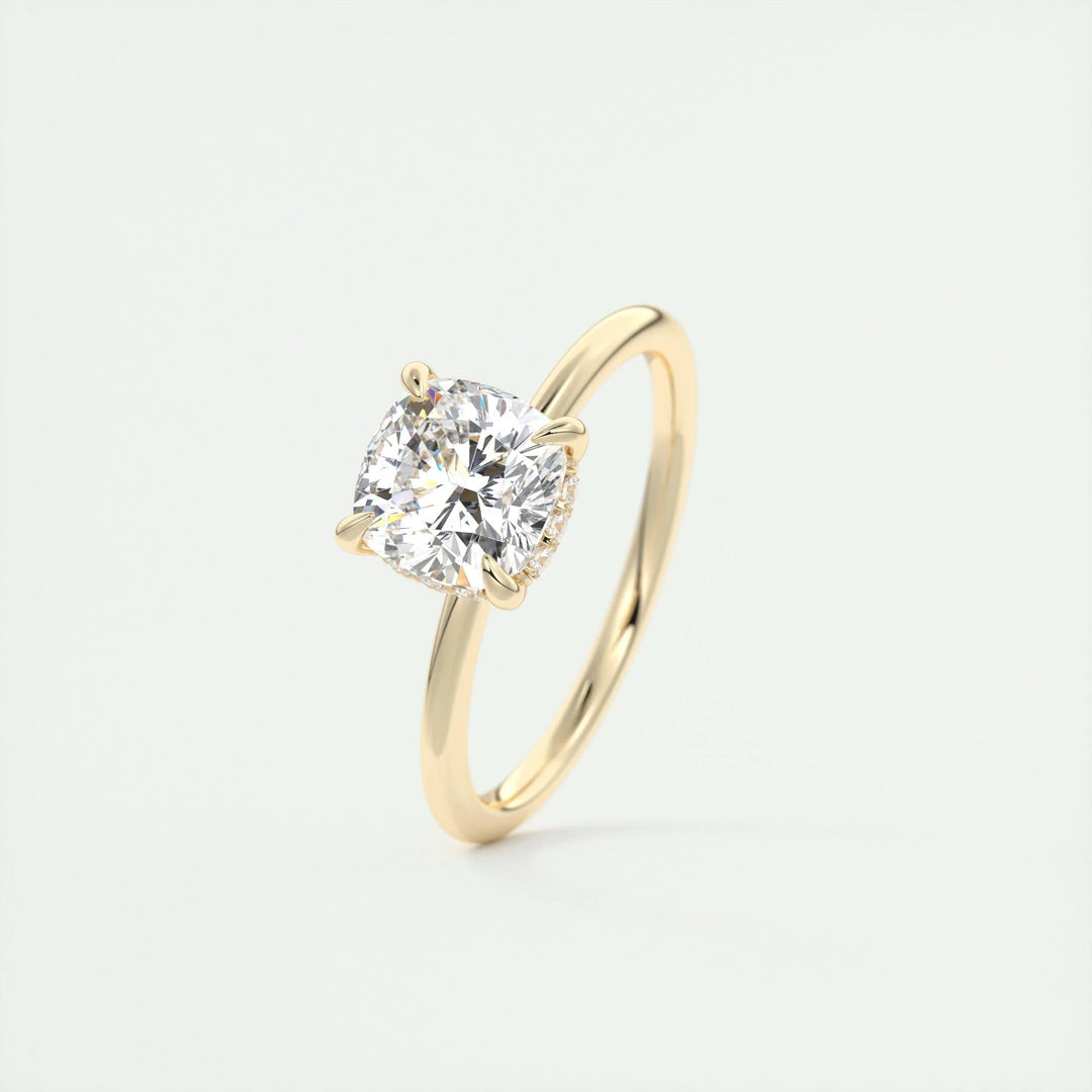 Profile view of cushion cut hidden halo engagement ring band