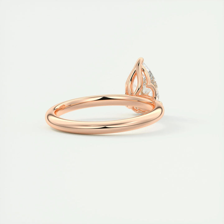 Pear solitaire lab grown diamond ring side profile in gold setting