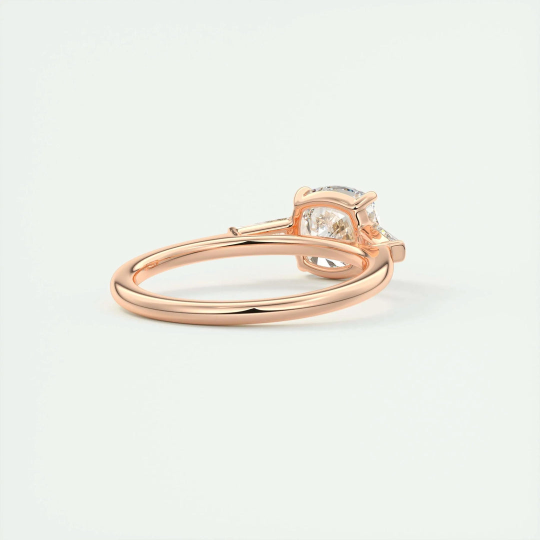 Cushion three stone engagement ring finished in polished solid gold