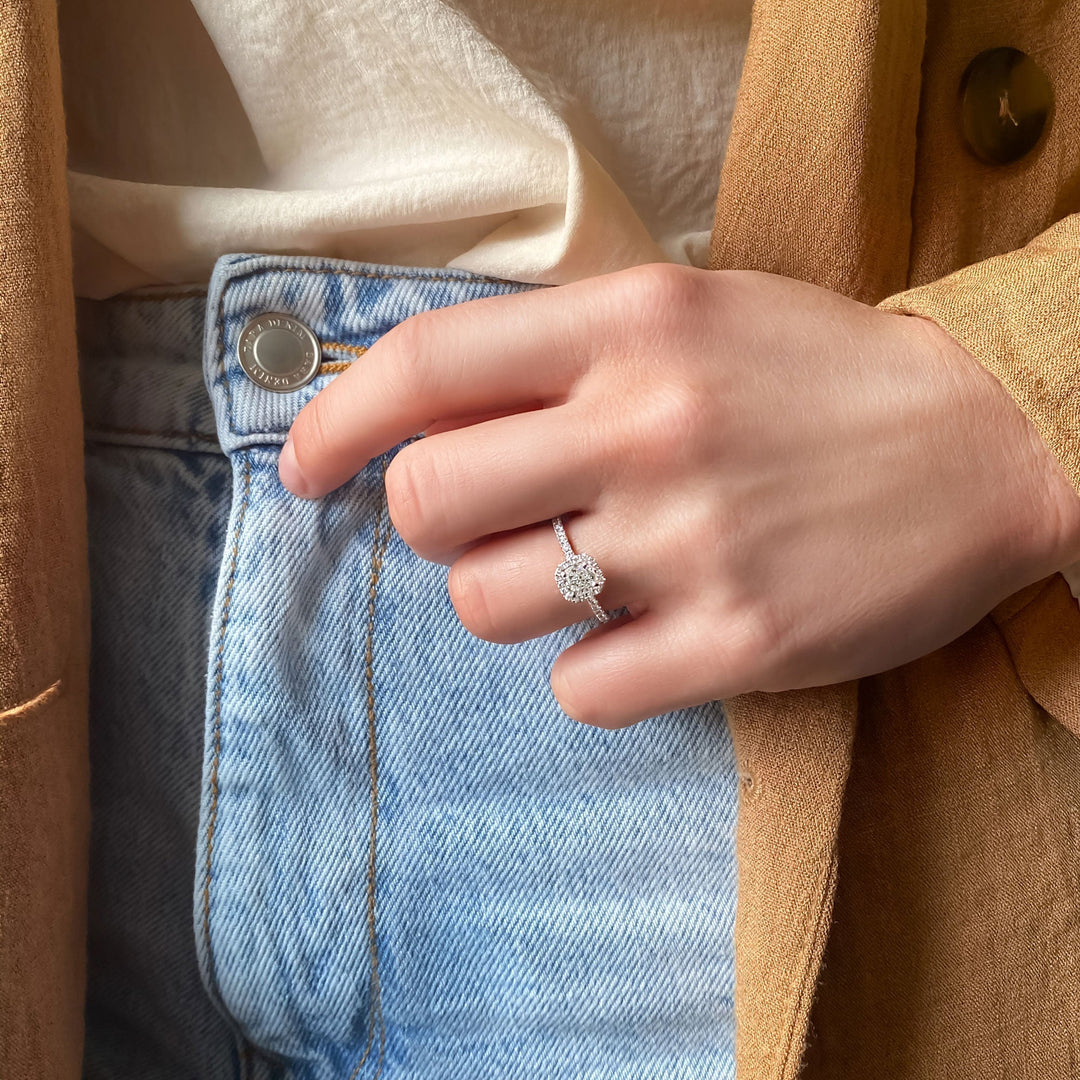 Cushion cut pave engagement ring shown in real-life wear