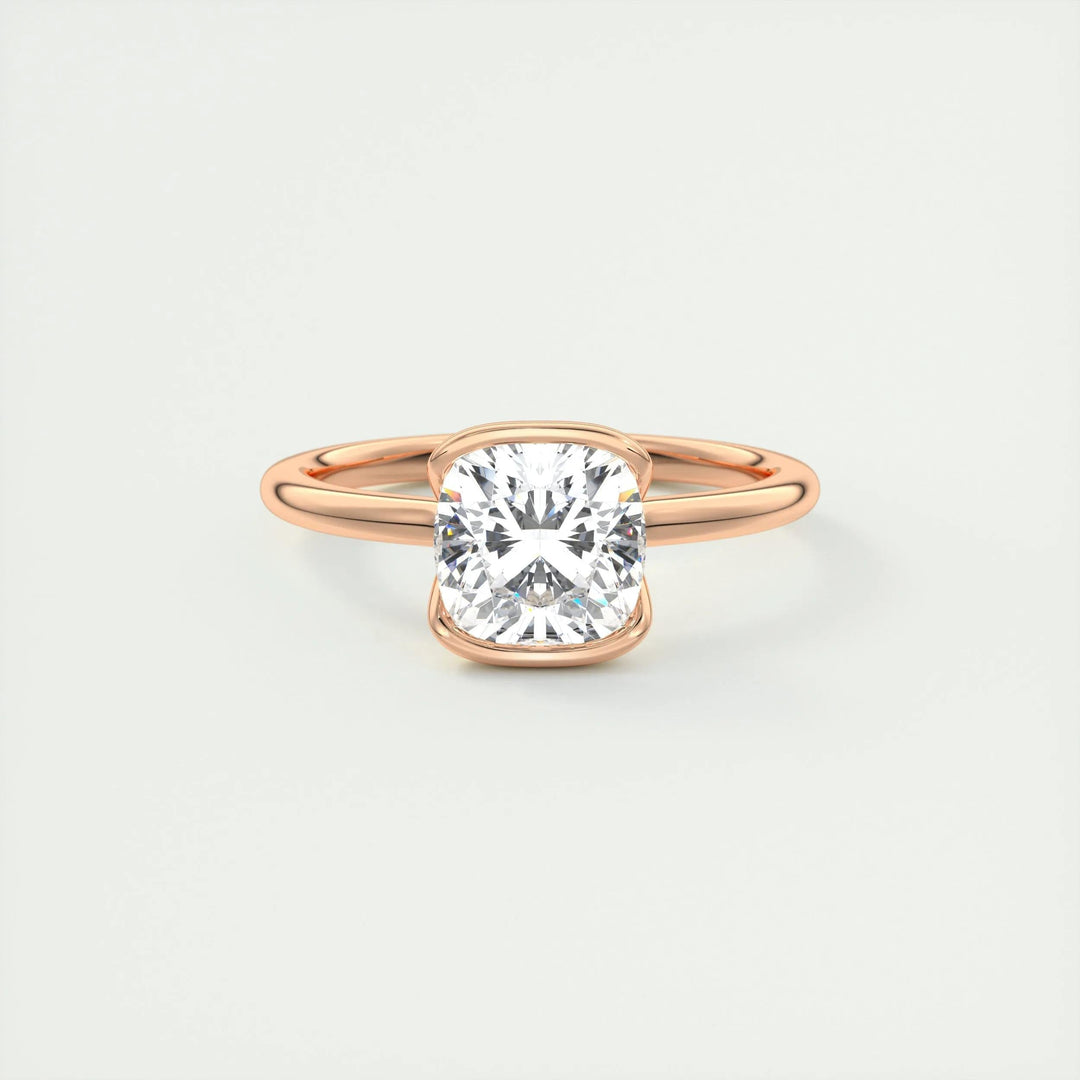 Macro shot of cushion cut diamond facets in solitaire ring setting
