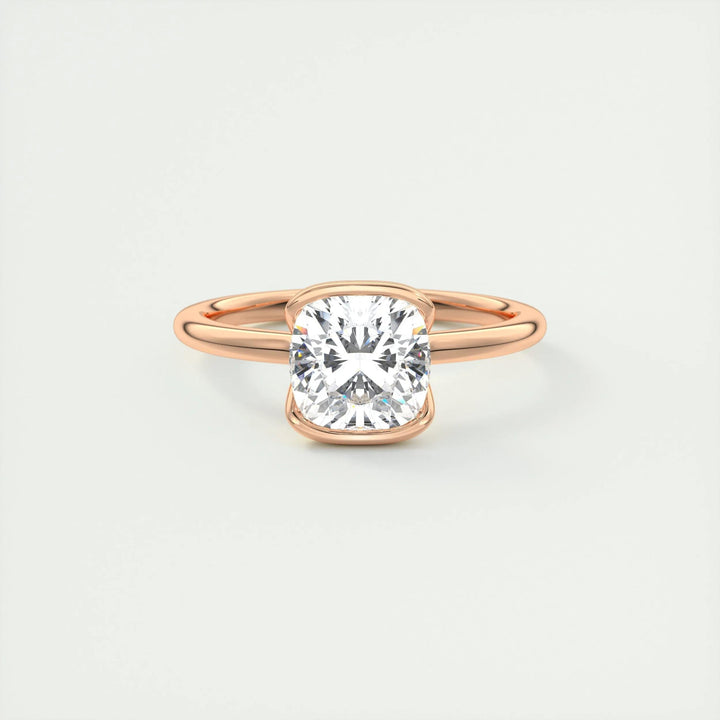 Macro shot of cushion cut diamond facets in solitaire ring setting
