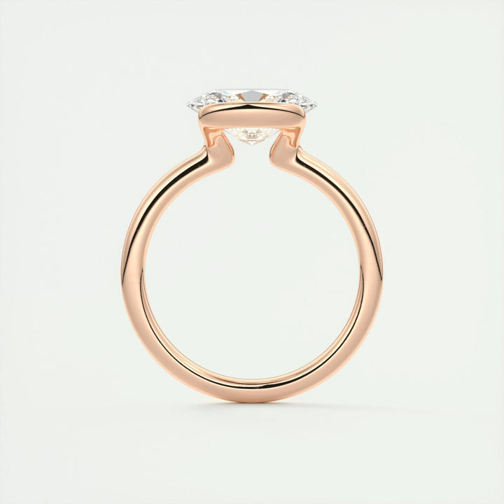 Oval bezel engagement ring photographed in natural light