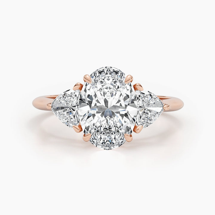Oval three stone engagement ring with certified lab grown diamond