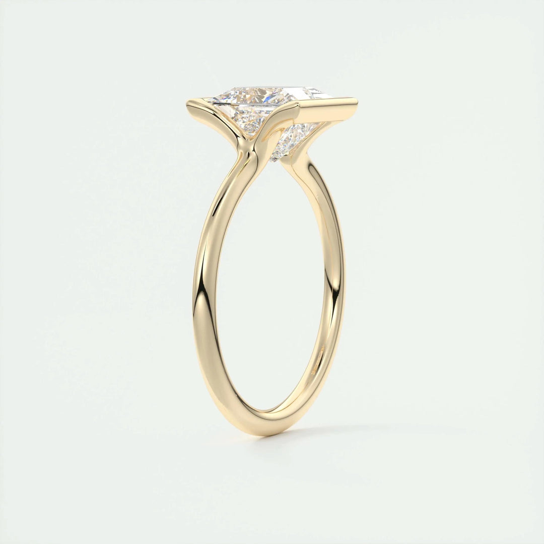 Princess solitaire engagement ring finished in polished solid gold