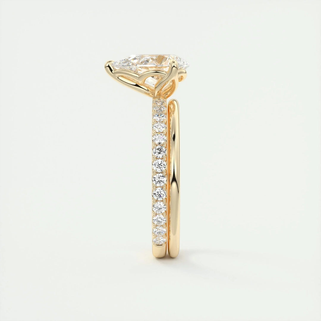Pear pave engagement ring photographed in natural light