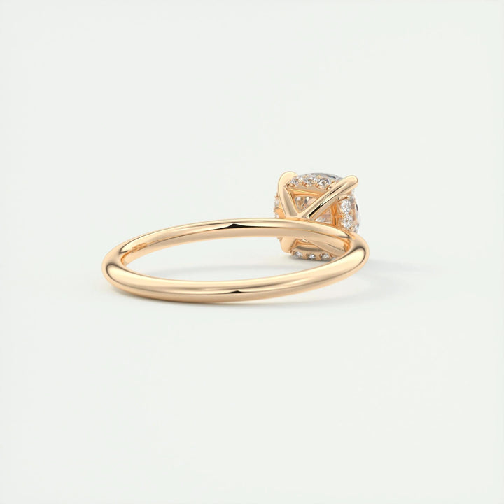 Lifestyle shot of cushion hidden halo diamond ring on hand