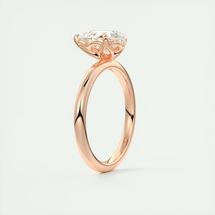 Side angle of pear solitaire diamond engagement ring