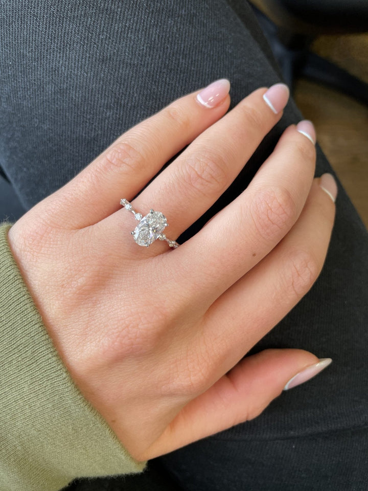 Fine craftsmanship detail on oval pave engagement ring