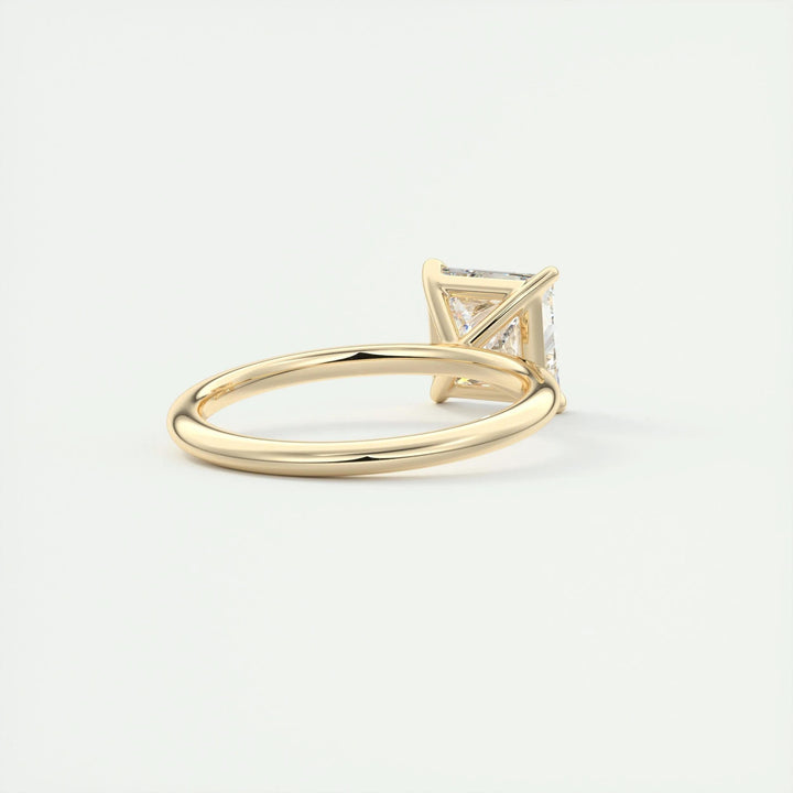 Princess solitaire engagement ring viewed from the side