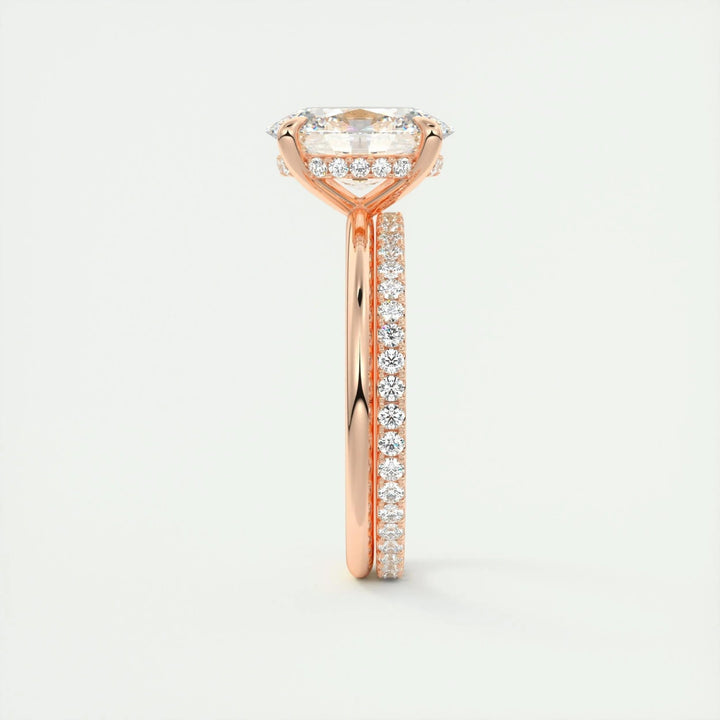 Oval hidden halo engagement ring finished in polished solid gold