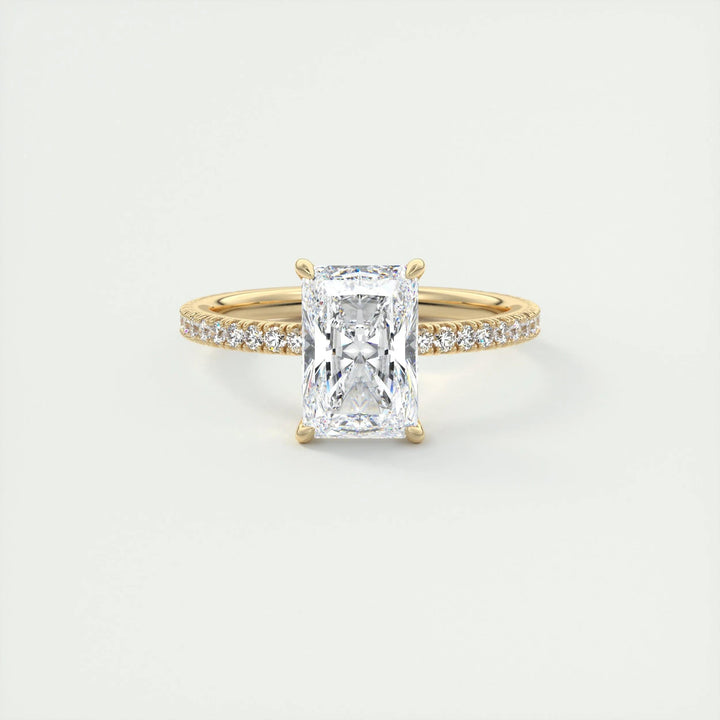 Macro shot of radiant cut diamond facets in pave ring setting
