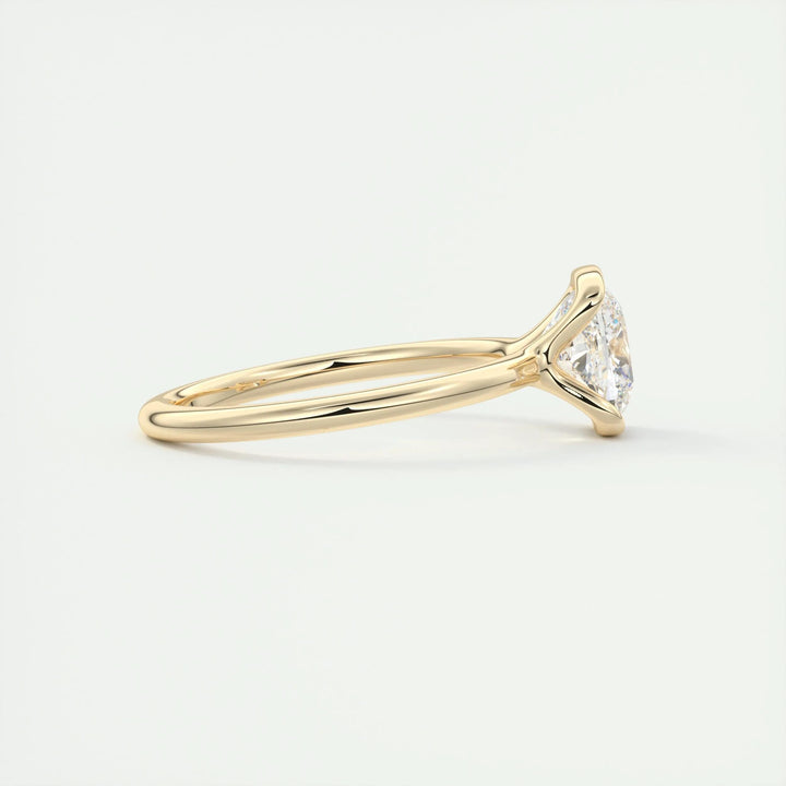 Cushion solitaire diamond ring displayed on jewelry stand