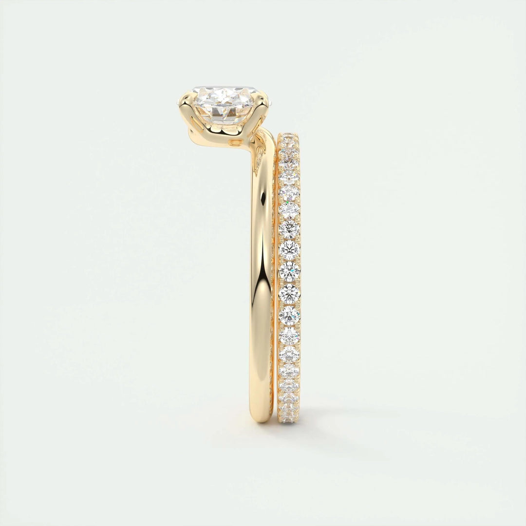 Close-up of oval cut center diamond in east west engagement ring