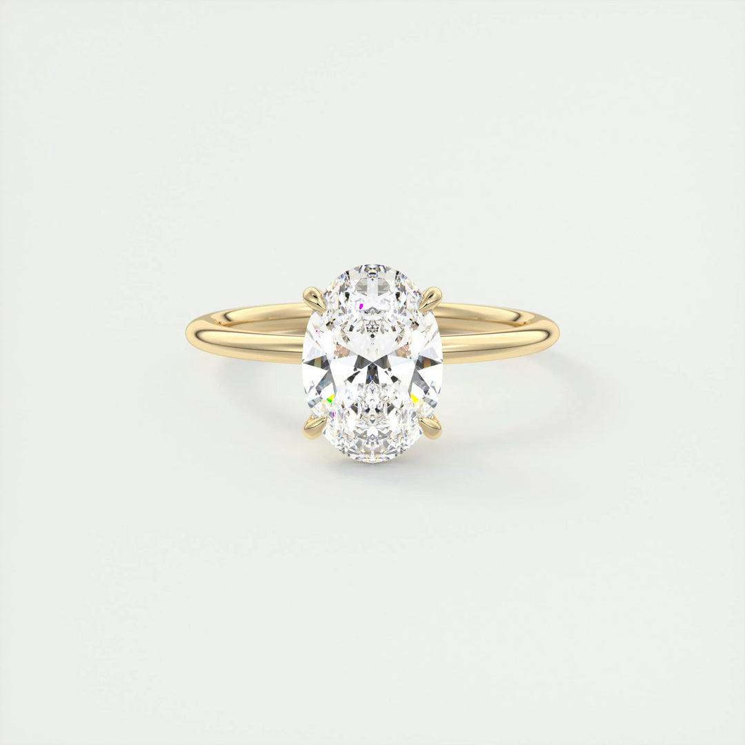 Oval solitaire lab grown diamond ring fitted on finger