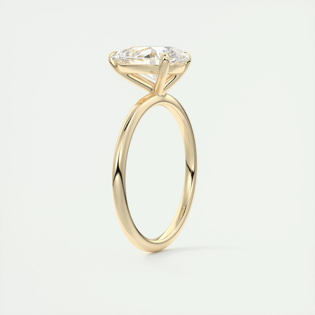 Pear cut diamond ring worn on hand