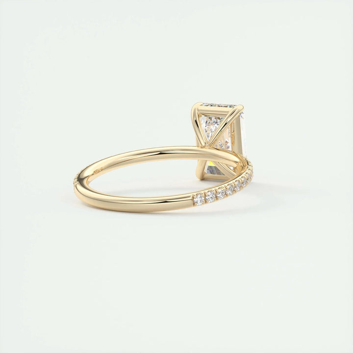 Emerald pave engagement ring photographed in natural light