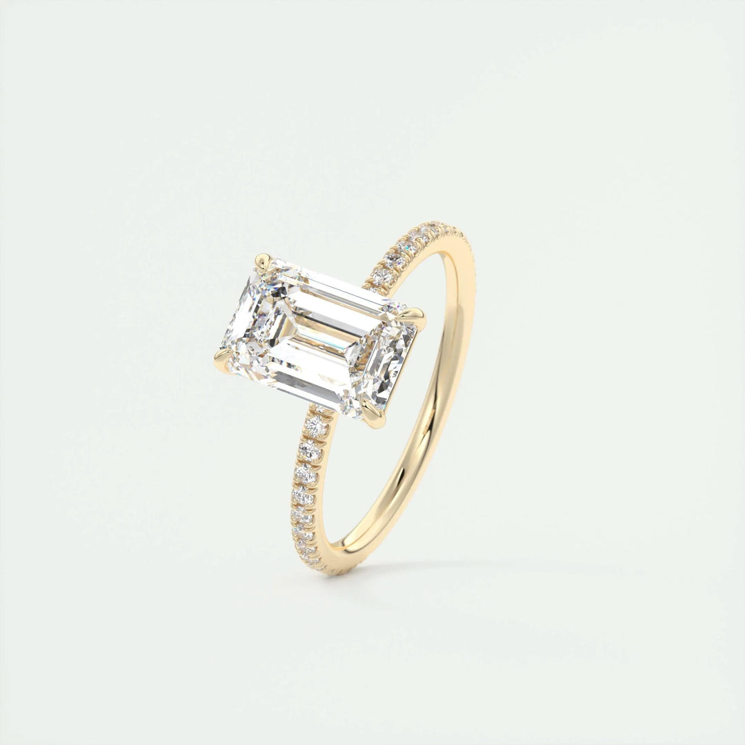 Top-down view of emerald cut pave engagement ring
