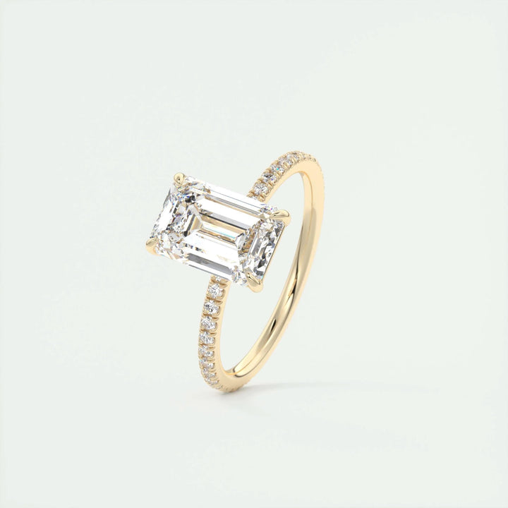 Top-down view of emerald cut pave engagement ring