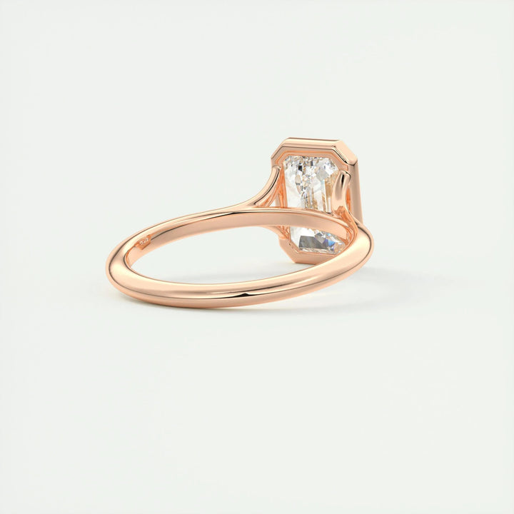 Shop the emerald cut bezel engagement ring collection online
