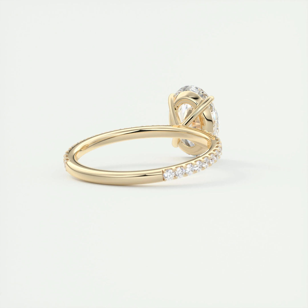 Oval pave engagement ring shown on hand for true-to-life sizing