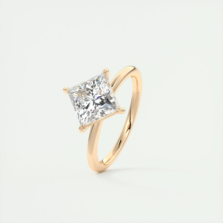 Princess cut solitaire engagement ring shown in real-life wear