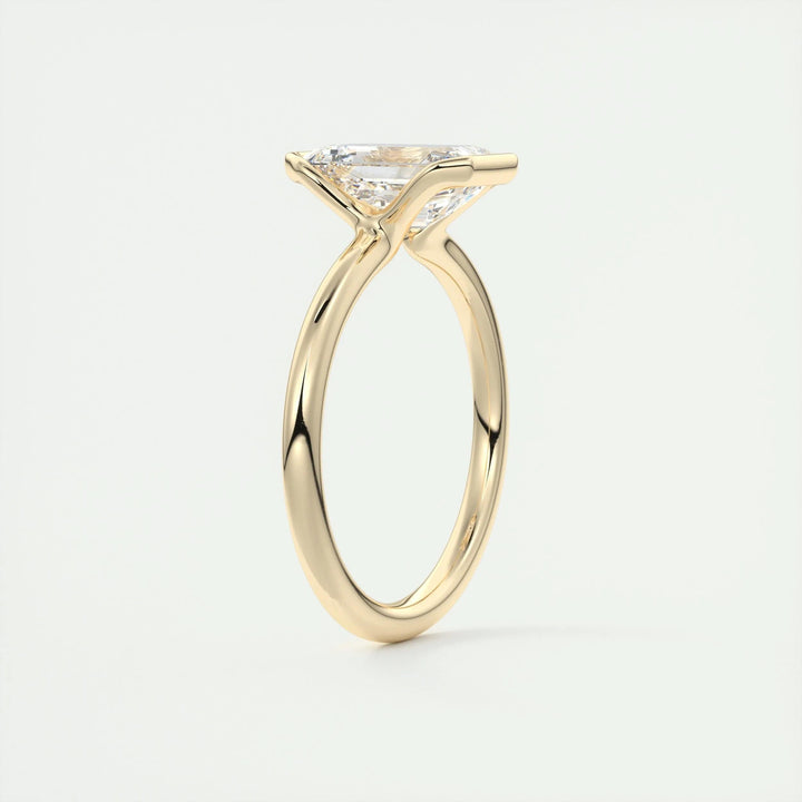 Macro shot of emerald cut diamond facets in solitaire ring setting