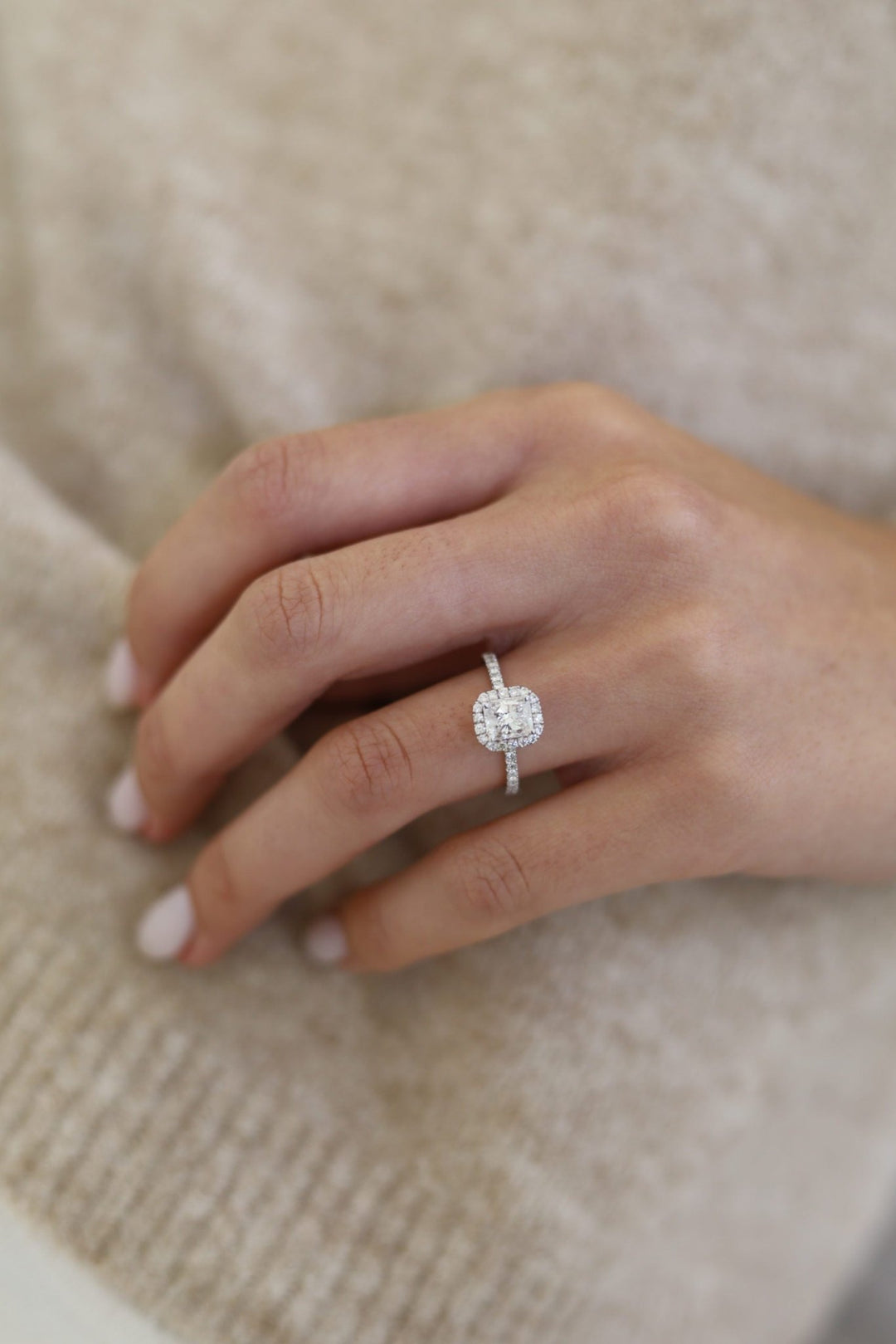 Radiant halo engagement ring finished in polished solid gold
