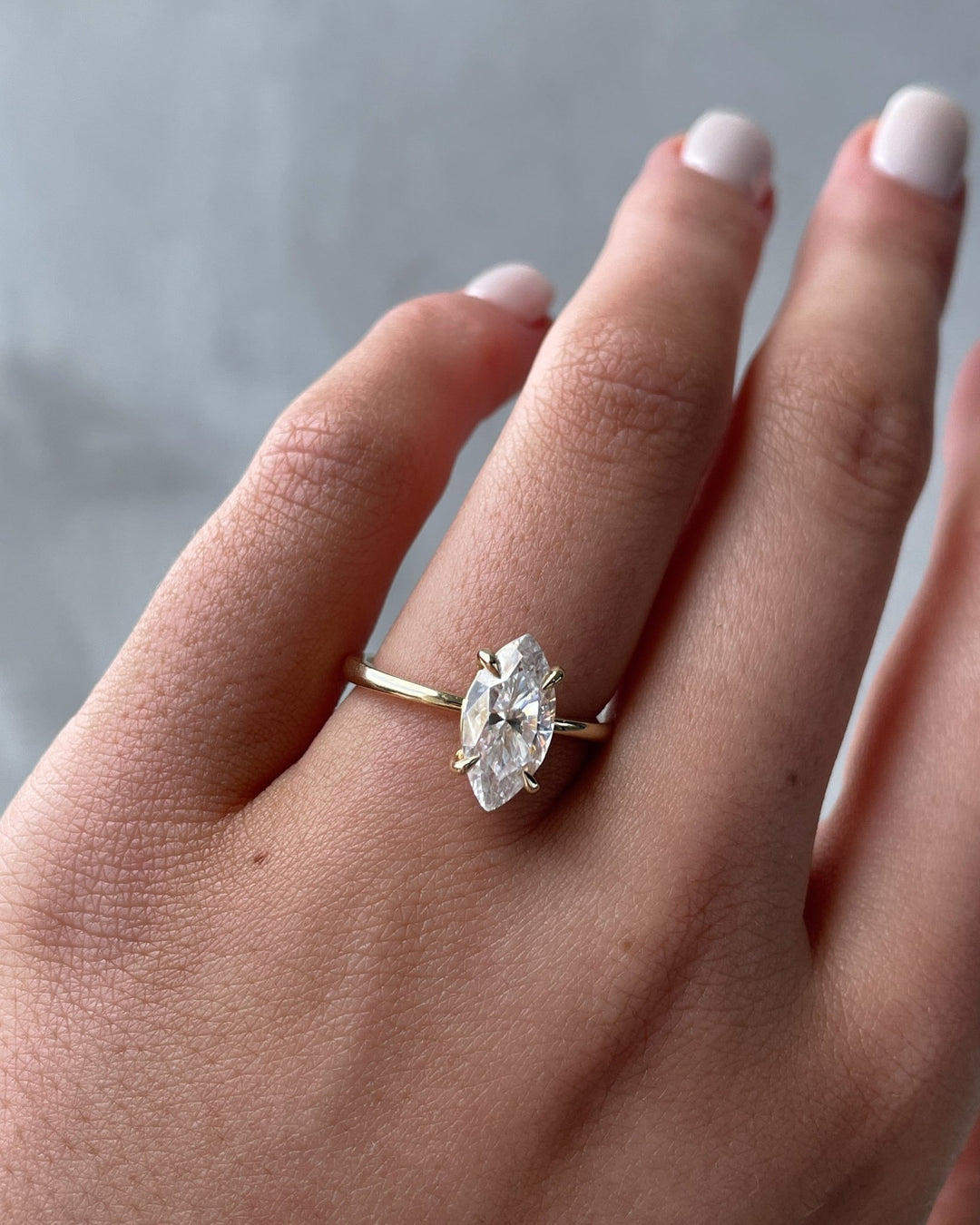 Marquise solitaire engagement ring with certified lab grown diamond