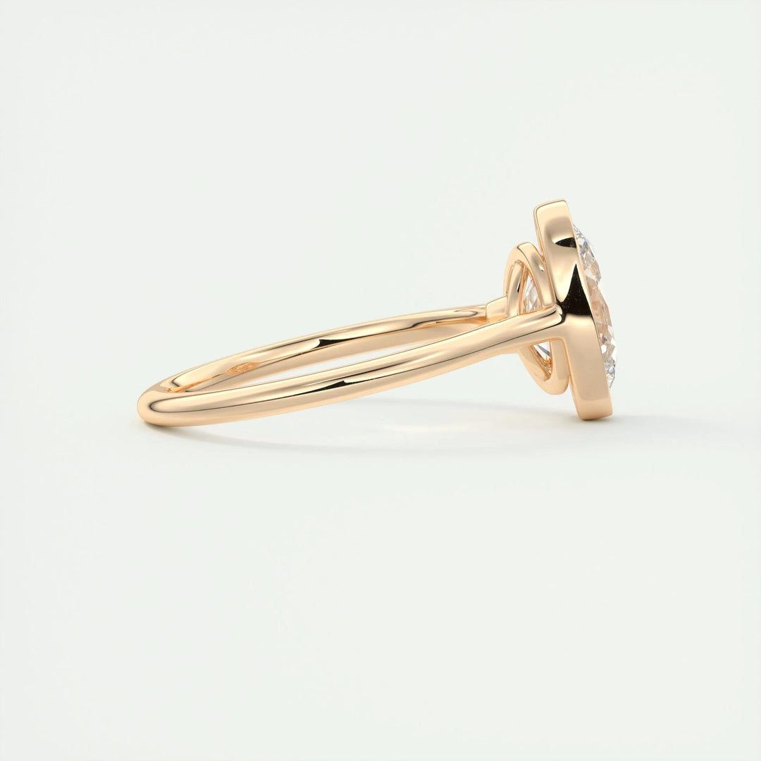 Oval bezel diamond engagement ring available in multiple metals