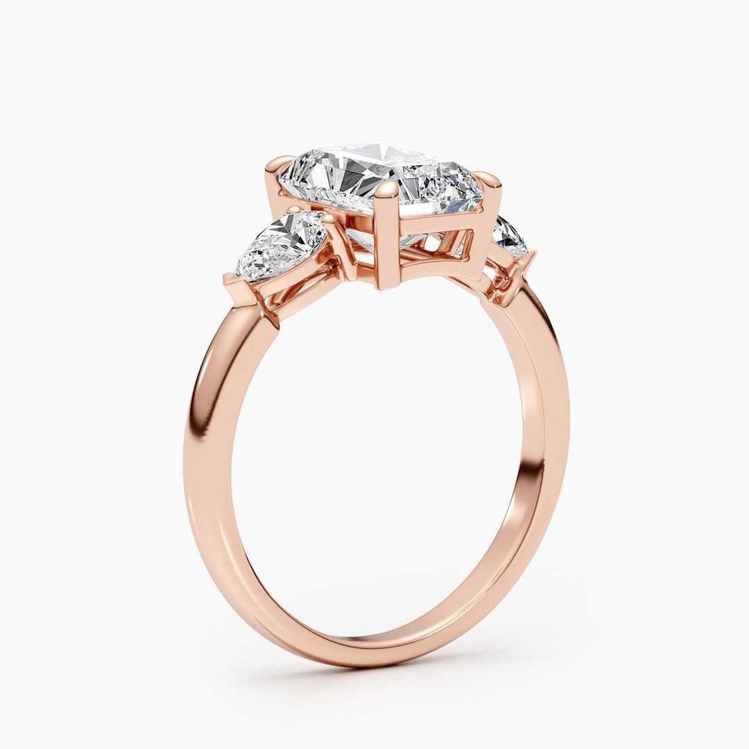 Radiant three stone lab grown diamond ring fitted on finger