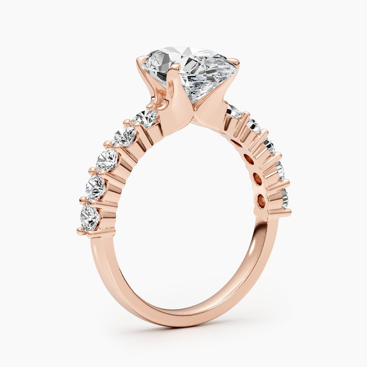 Certified oval cut diamond featured in pave engagement ring