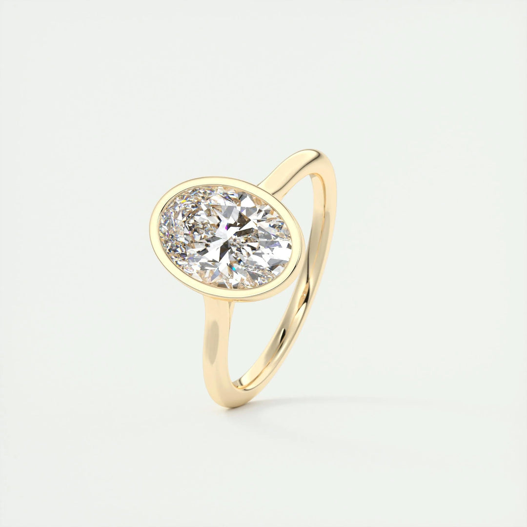 IGI certified oval cut diamond in bezel engagement ring setting