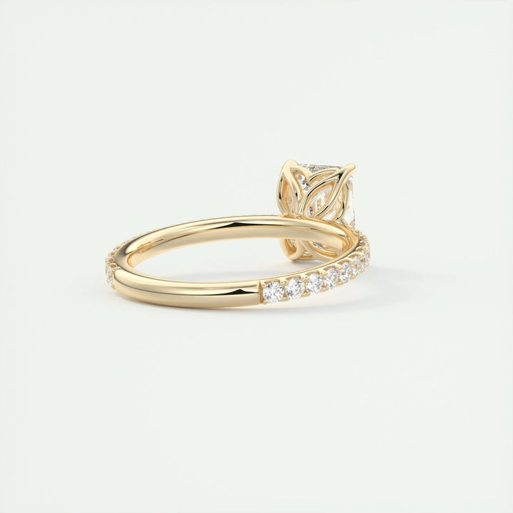 Emerald pave engagement ring photographed in natural light
